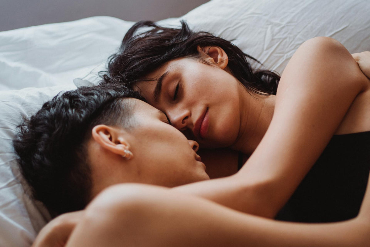 intimate couple on bed